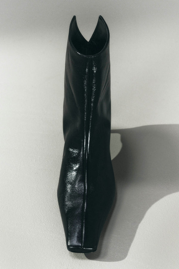 Ona Ankle Boot in Black Glazed Leather EDITORIAL IMAGE